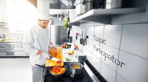 Chef In Kitchen Wearing a Toque